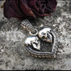 Double Skull Heart Pendant